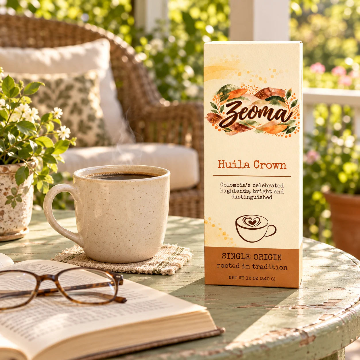 Huila Crown coffee and a cup on a peaceful porch beside an open book